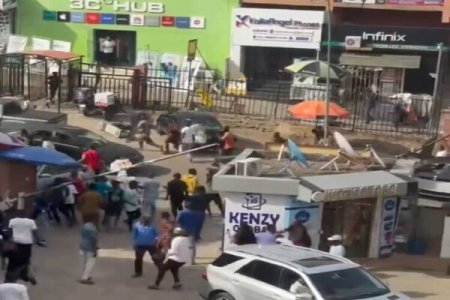 Tension in Abuja as Armed Soldiers Shutdown Banex Plaza Amidst Trader Conflict