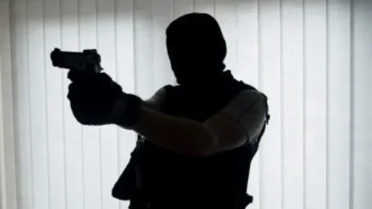Hooded-man-in-gun.jpg Hooded-man-in-gun.jpg