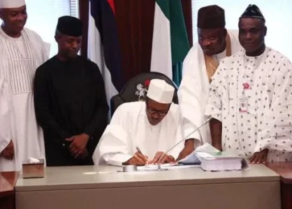 buhari signs.JPG buhari signs.JPG