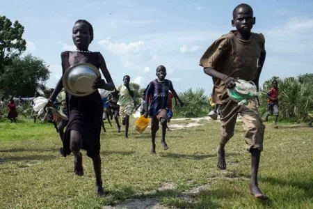 Daily Nation-Children run to a food drop-off point.jpg Daily Nation-Children run to a food drop-off point.jpg