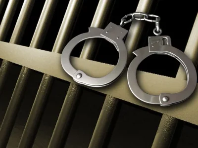 Prison-bars-and-handcuffs.jpg Prison-bars-and-handcuffs.jpg