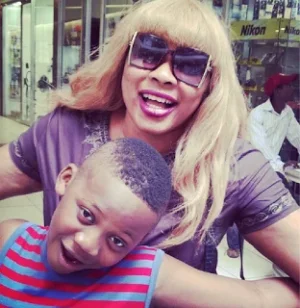 Ayo Adesanya and her son.png Ayo Adesanya and her son.png