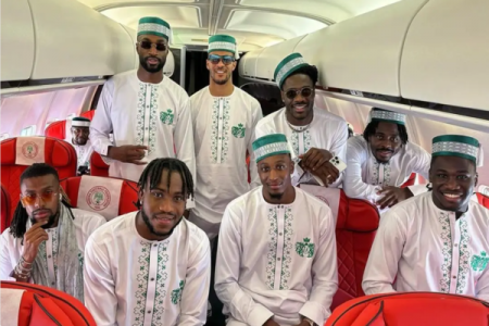 Super Eagles' Stylish AFCON 2023 Airport Look: Traditional Kaftans and Green Caps On Point