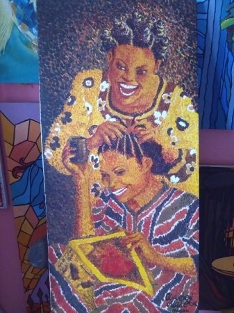 weaving Lar's hair. pointillism. oil on canvas. 38 x 18    inches.Oluwaseyi Alade Asher.jpg