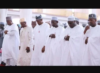 saraki and Buhari praying.JPG