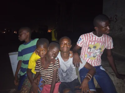 Child conductors at Orile under the railway bridge at night.jpg Child conductors at Orile under the railway bridge at night.jpg